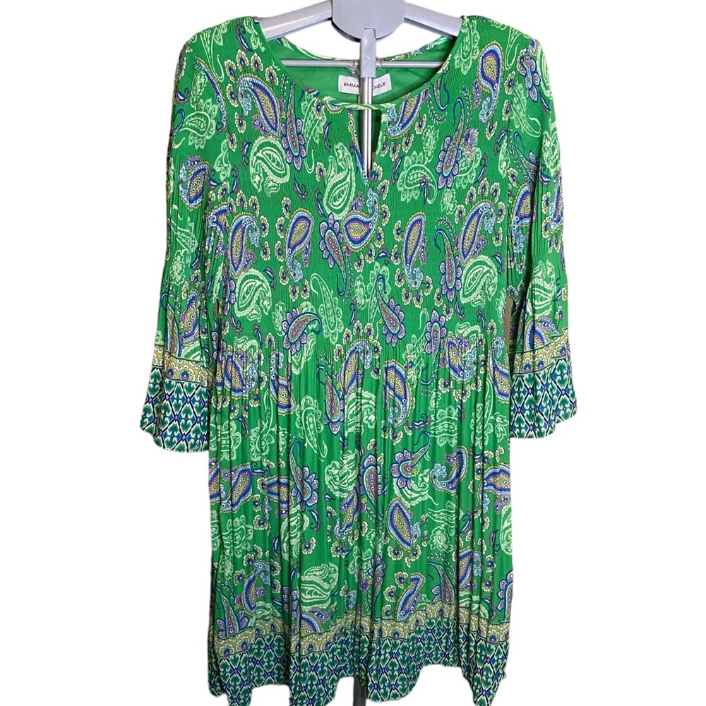 Emma and Michele green dress with flared ruffled sleeves